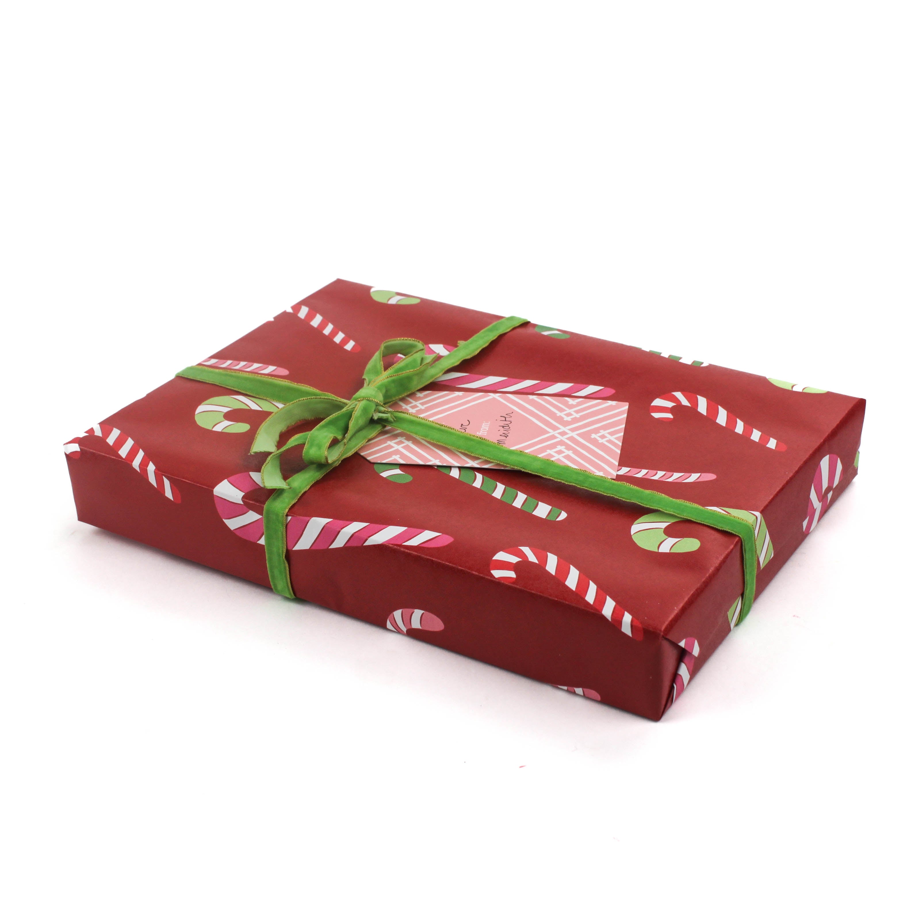 colorful christmas wrapping paper with colored candy cane motifs