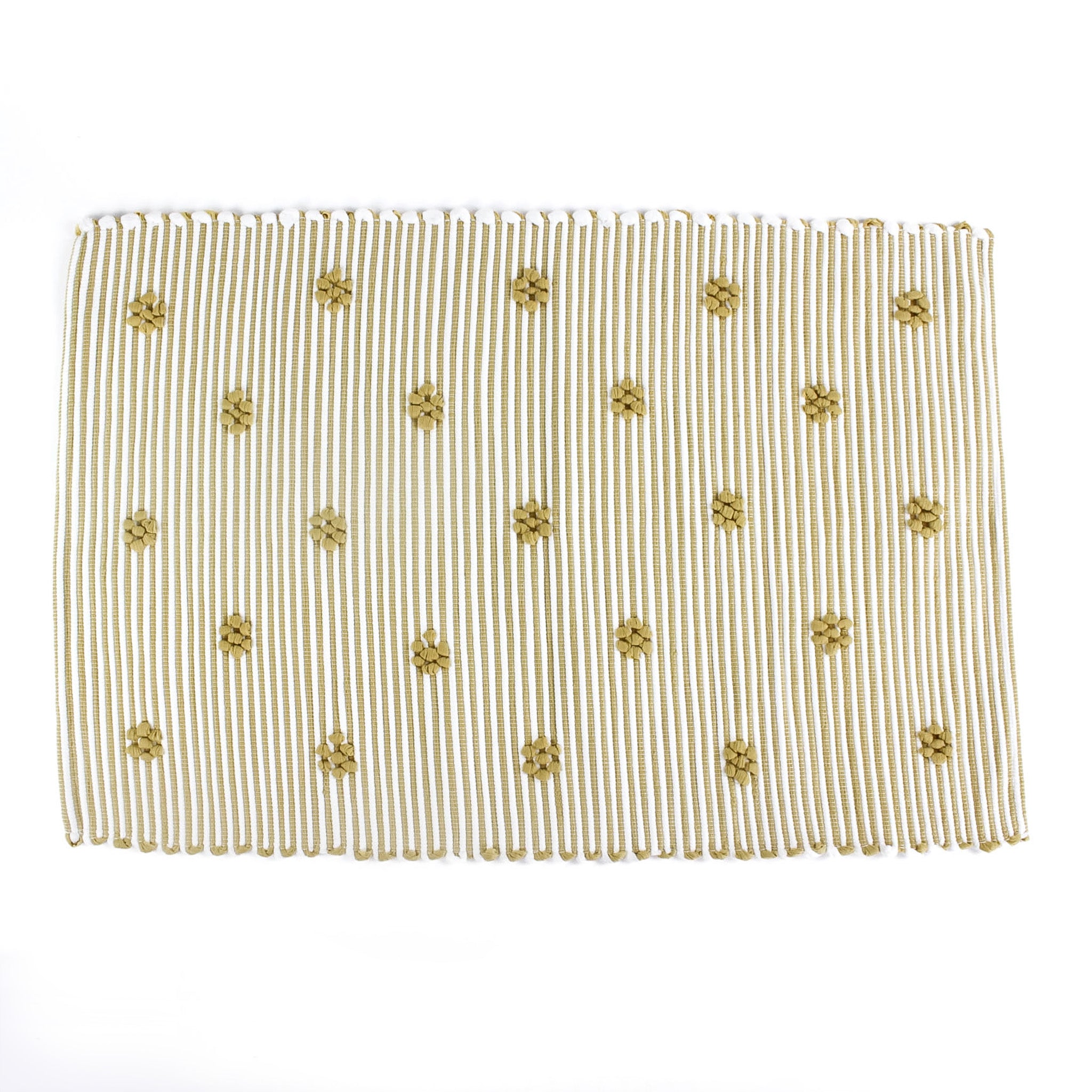 A yellow accent rug with a daisies pattern on it