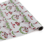 Cute Christmas wrapping paper decorated with white dancing mice holding ornaments and gift bags.