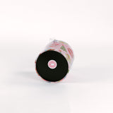 Darling Ornaments in pink ice bucket decorated with ornament motifs showing the bottom view