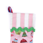 Pink Christmas stocking with colorful ornaments on a white background