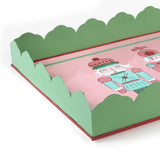 corner of a Hand-Painted Metal Christmas Nutcracker Tray featuring three colorful nutcrackers