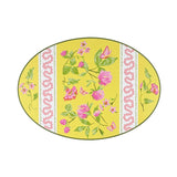 Round yellow easter egg paper placemat with yellow and pink floral design on a white background