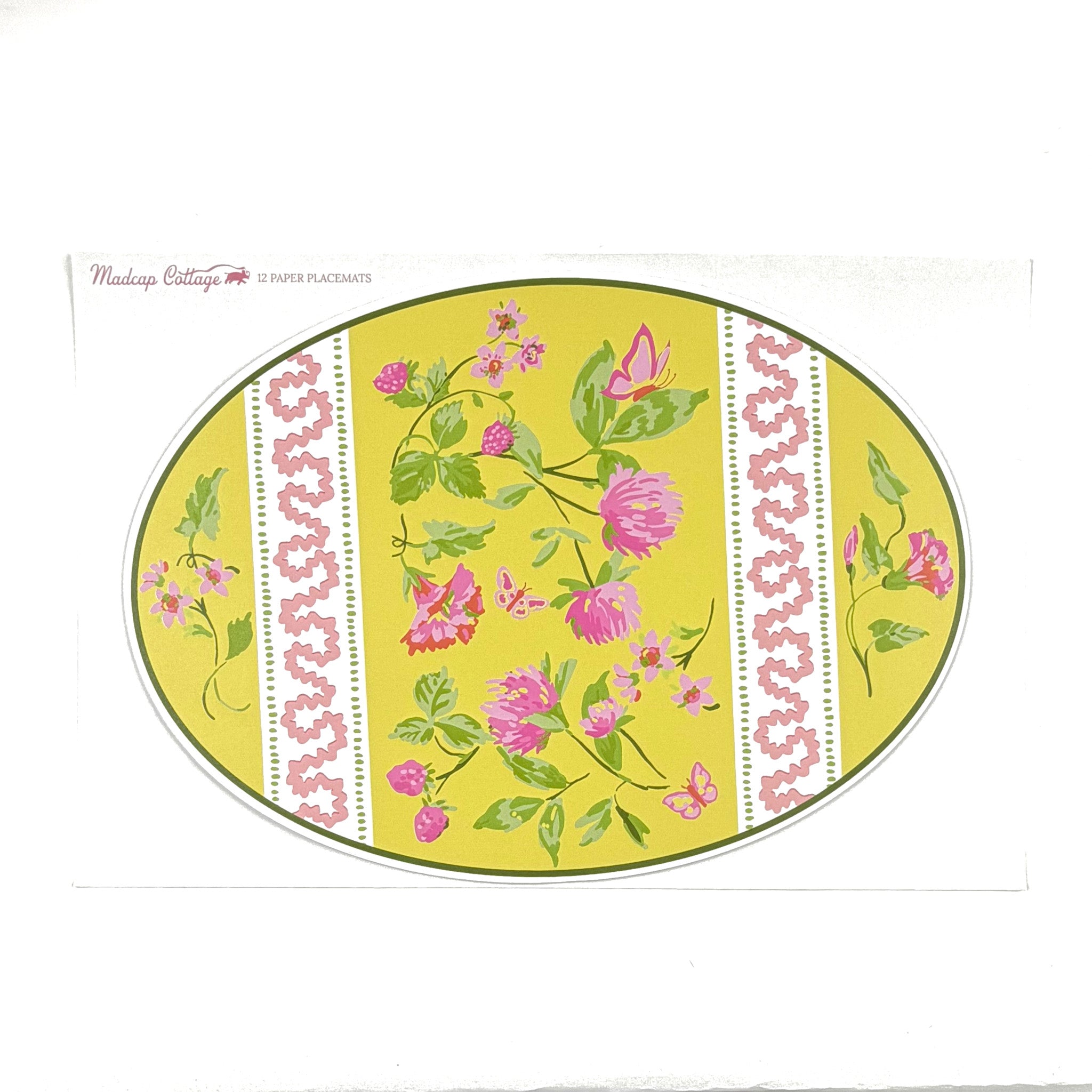 a packet of yellow floral paper placemats in the shape of an easter egg with text that reads Madcap Cottage 12 paper placemats in the top left corner.
