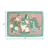 dimensions of a green and pink rug with a green pug motif and a green geometric border