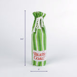 green and white striped bottle bag with “Beats Coal!” label, standing upright measuring about 14.5 inches high and 6 inches wide, Christmas tea towel style design
