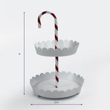 White two tier tray with scalloped edges and a candy cane striped handle shown with 18 inch height and 12.25 inch width.