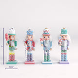 Set of four pastel nutcracker figurines holding candy themed accessories shown with a 5 inch height and 1.375 inch base width.