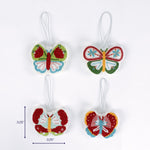 Set of four colorful beaded butterfly ornaments shown with one measuring about 3.25 inches tall and 3.25 inches wide.