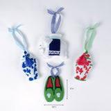 Set of four colorful felt ornaments including jars, slippers, and an elephant shown with one measuring about 5 inches high and 3.5 inches long.