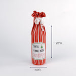 red striped wine bag with “Santa, I have been goodish” printed on the front.