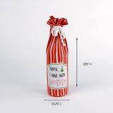 red striped wine bag with “Santa, I have been goodish” printed on the front.