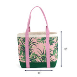 Large canvas tote bag with pink and green tropical leaf pattern, green base panel, and pink shoulder straps, shown with 18-inch width and 12-inch height dimensions