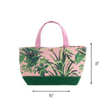 Small Jungle Road canvas tote bag with pink and green tropical leaf print, 15 by 8 inch reusable tote on white background