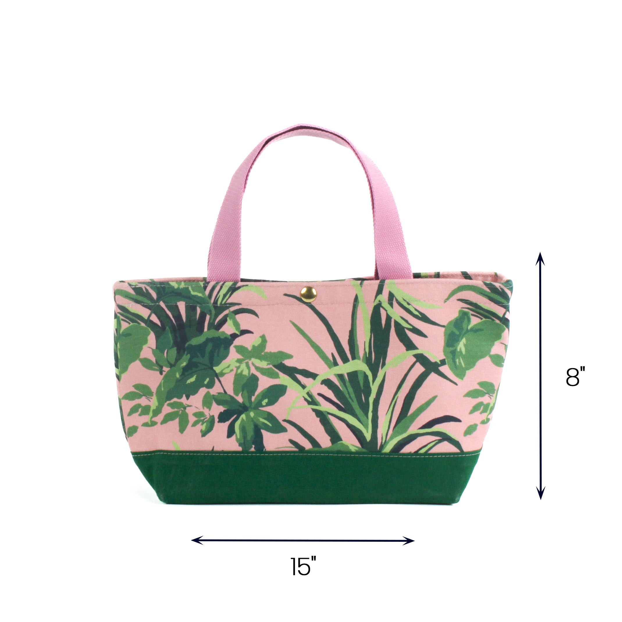 Small Jungle Road canvas tote bag with pink and green tropical leaf print, 15 by 8 inch reusable tote on white background