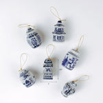 Set of six blue and white chinoiserie Christmas ornaments in jar and pagoda shapes shown with one measuring about 3.25 inches tall and 2 inches wide.