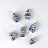 Set of six blue and white chinoiserie Christmas ornaments in jar and pagoda shapes shown with one measuring about 3.25 inches tall and 2 inches wide.