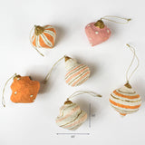 Orange and pink paper-mâché Christmas ornaments with stripes and polka dots, approx. 3.5 inches.
