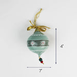 Hand-painted Christmas ornament with green and white pattern and gold ribbon, 7 inches wide and 4 inches tall, Christmas tea towel.