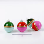 colorful round glass christmas ornaments set of four with gold stripe design shown in assorted bright colors measuring 3 inches wide