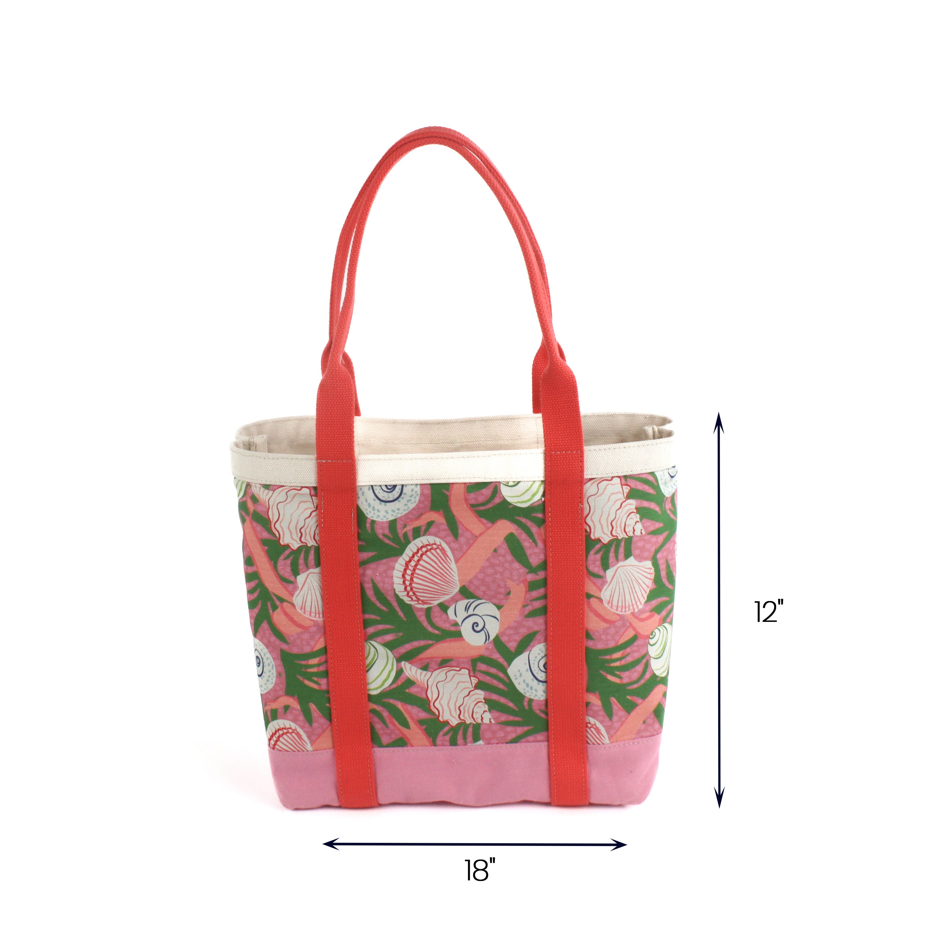 Large pink and green canvas tote bag with seashell pattern, coral-red handles, and reinforced base, measuring 18 inches wide by 12 inches tall