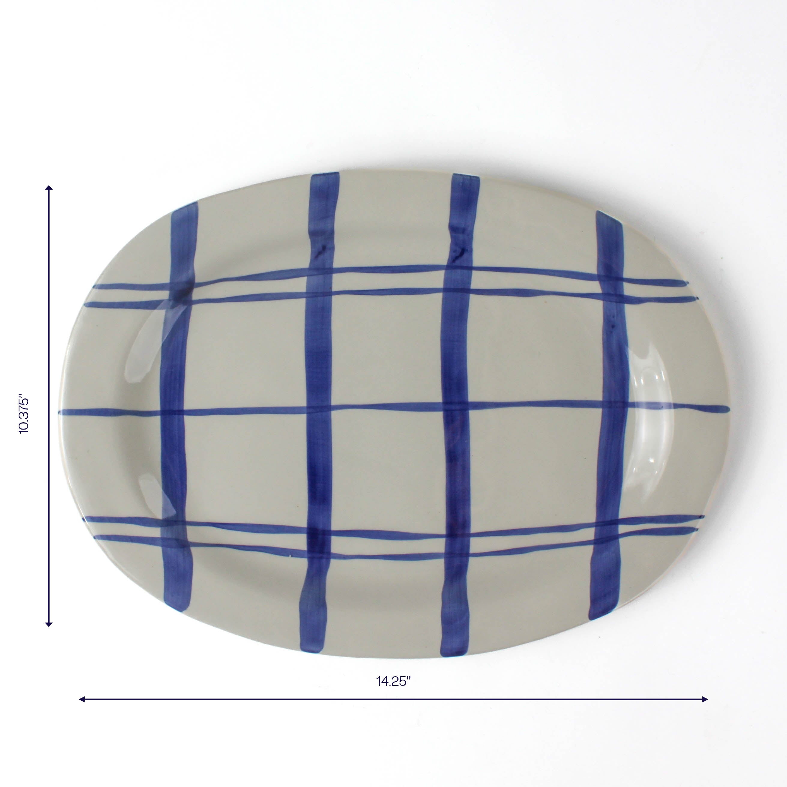 Oval ceramic serving platter with hand-painted blue grid pattern, 14.25 inches long and 10.375 inches wide.