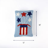 Light blue rectangular pillow with red, white, and blue starburst design and an American flag–themed base, measuring 18 inches high and 12 inches long.