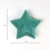 Teal star-shaped ceramic dish, 5.875 inches wide.