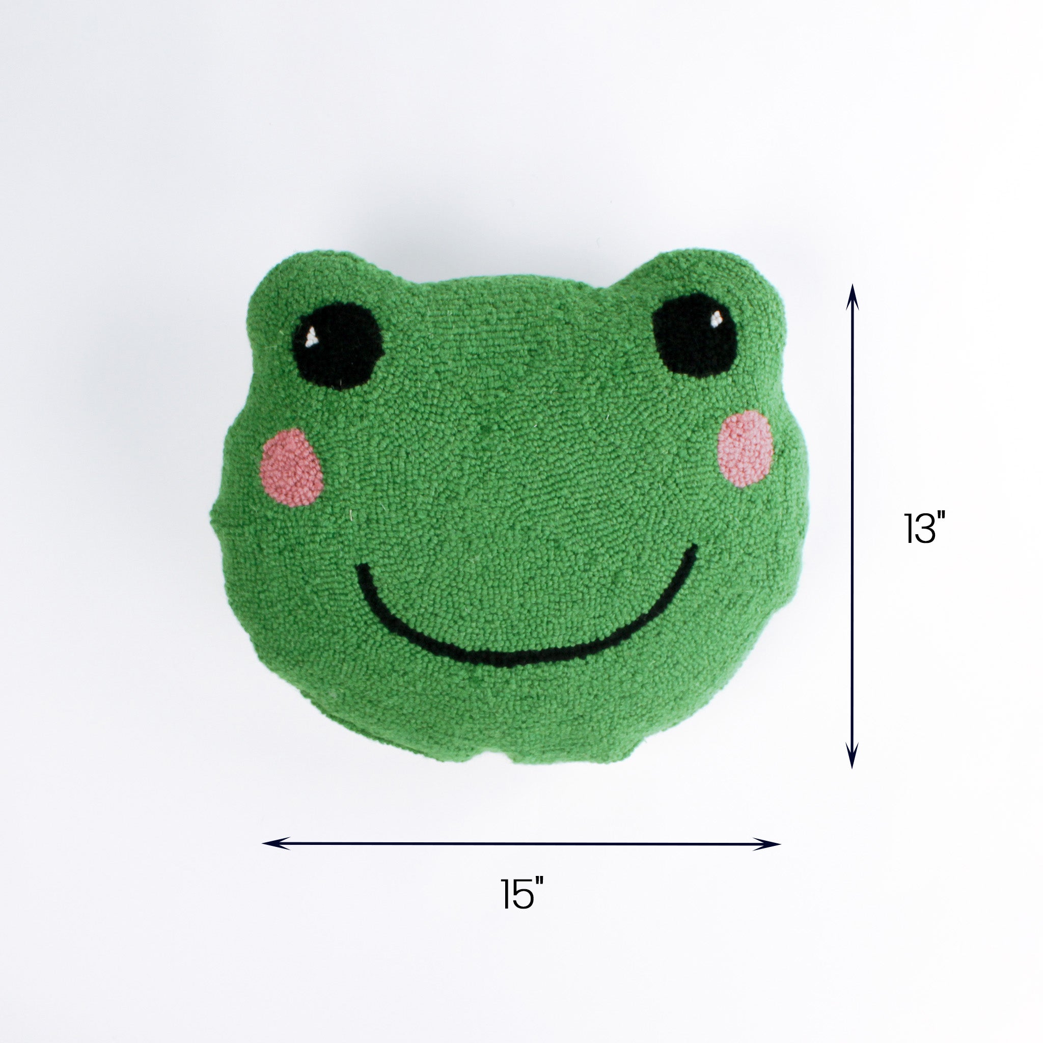 Green frog face pillow with pink cheeks and a smiling expression shown with 15 inch width and 13 inch height.