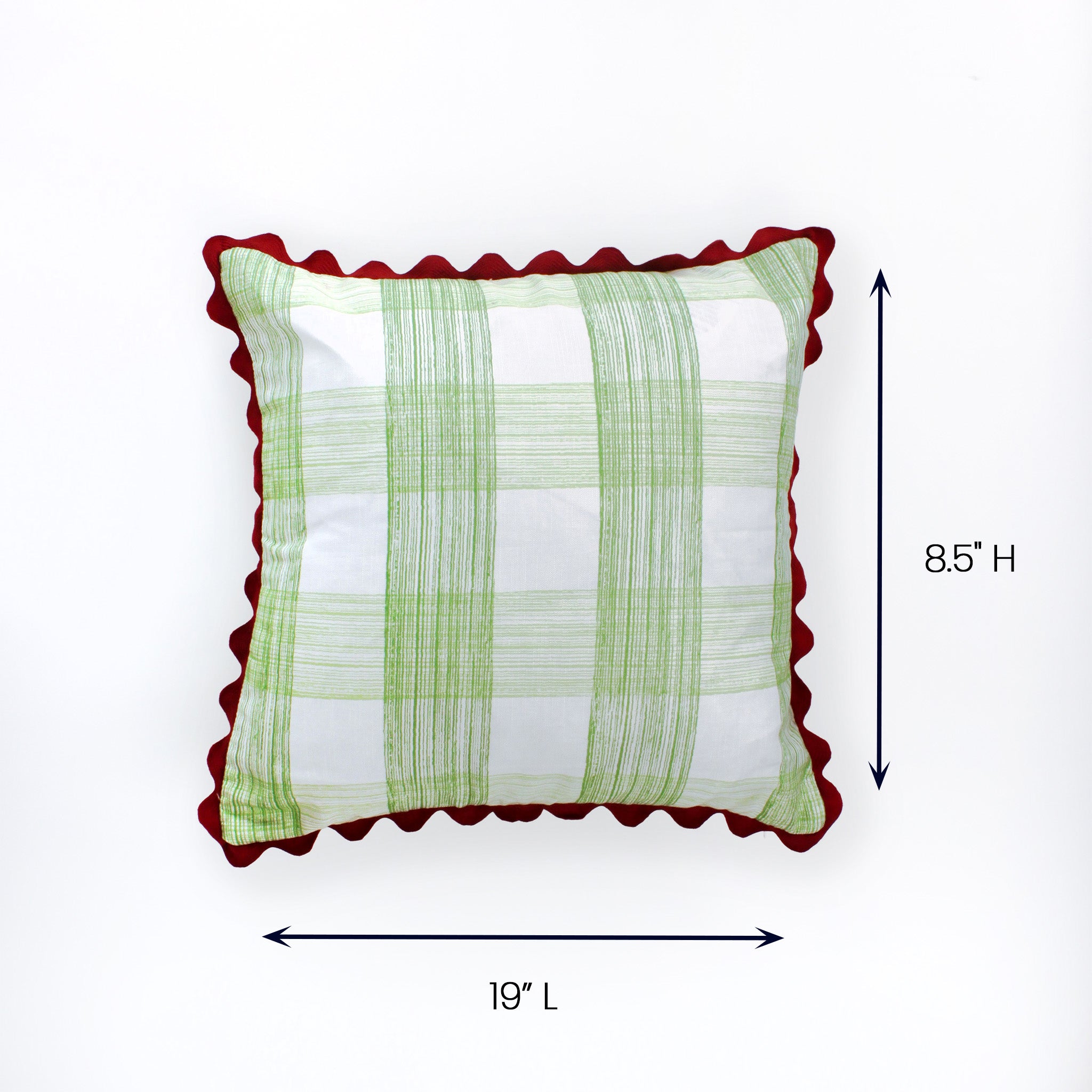Square pillow with green plaid design and red scalloped edges shown with 19 inch length and 8.5 inch height.