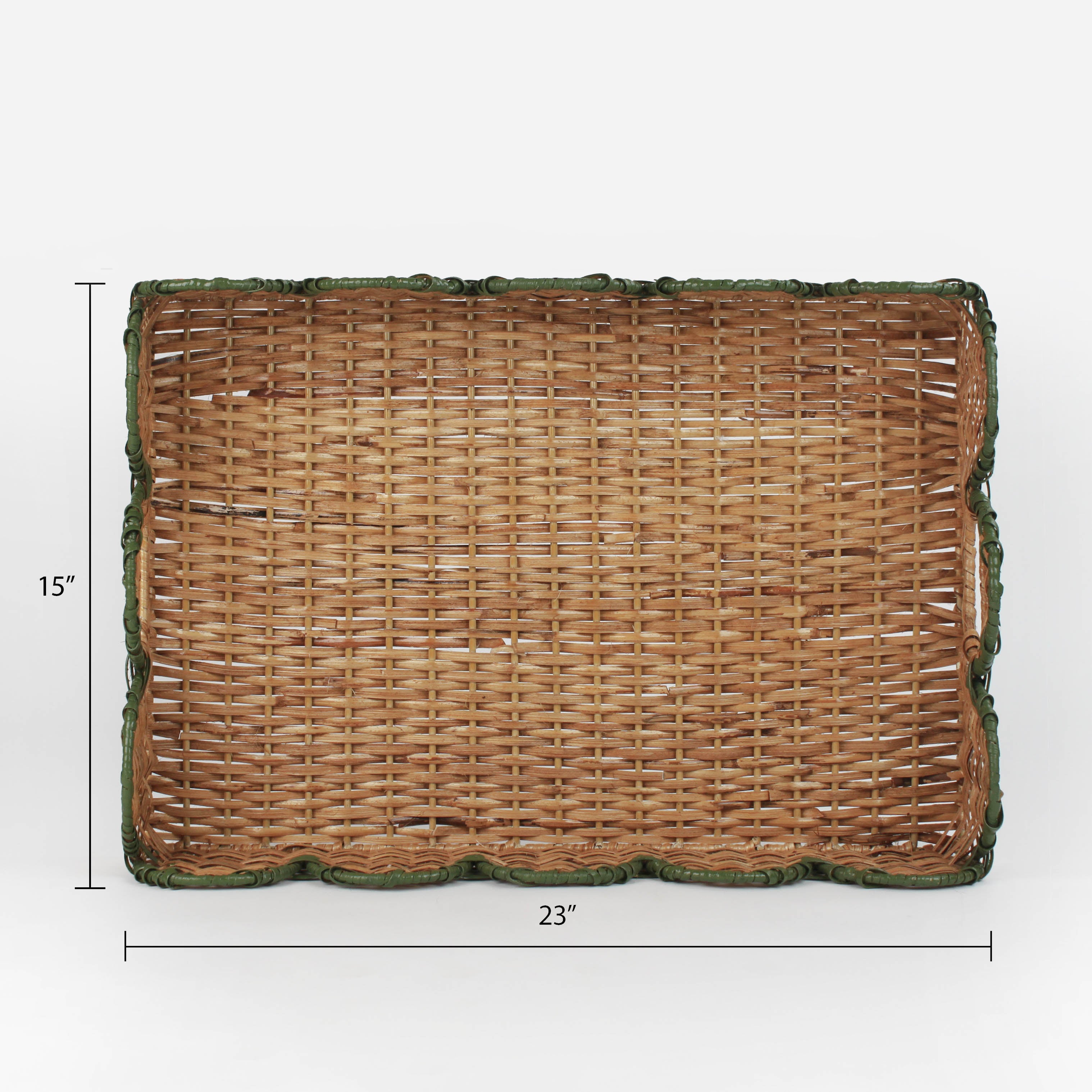 Rattan tray with scalloped edge and green trim on a white background and dimensions marked 15" x 23"