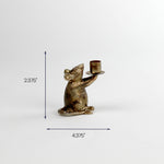 Small brass mouse candle holder, 2.375 inches tall.