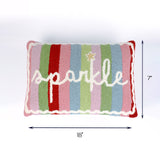 Rectangular pillow with colorful vertical stripes and the word sparkle across the front shown with 18 inch width and 7 inch height.