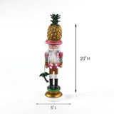 Christmas nutcracker figurine with gold pineapple hat, pink outfit, standing 20 inches tall.