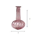 Small pink glass bud vase with rounded base, measuring 5 inches tall and 3 inches wide.