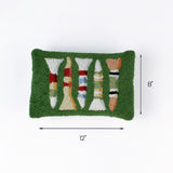 Green rectangular pillow with colorful fishing lure designs shown with 12 inch length and 8 inch height.