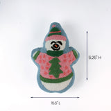 Snowman-shaped decorative pillow wearing a pink sweater and hat shown with 15.5 inch length and 5.25 inch height.