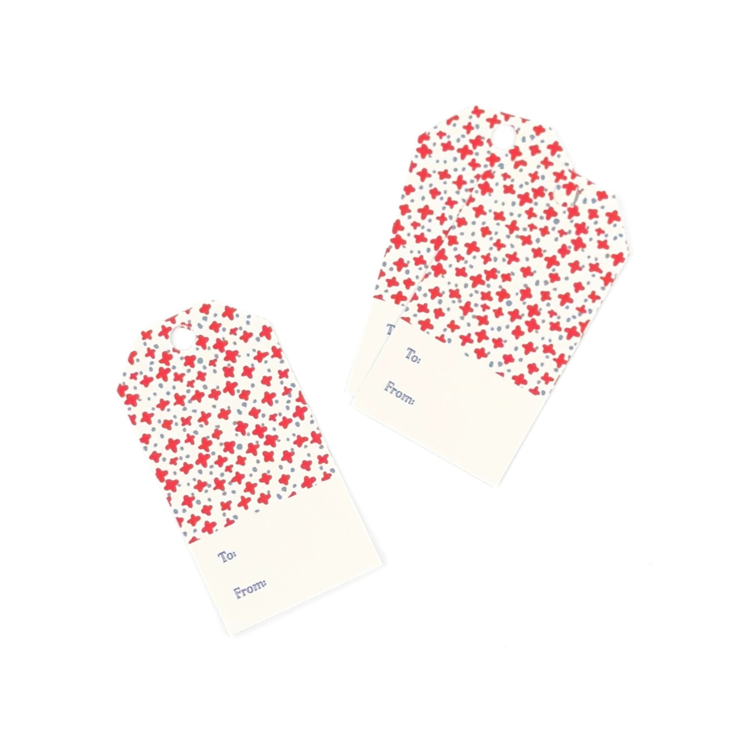 Dune Road gift tags featuring charming red floral stars, delicate blue accents, and personalized fields.