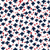 Navy blue starburst and red dot ditsy pattern fabric on a white background.