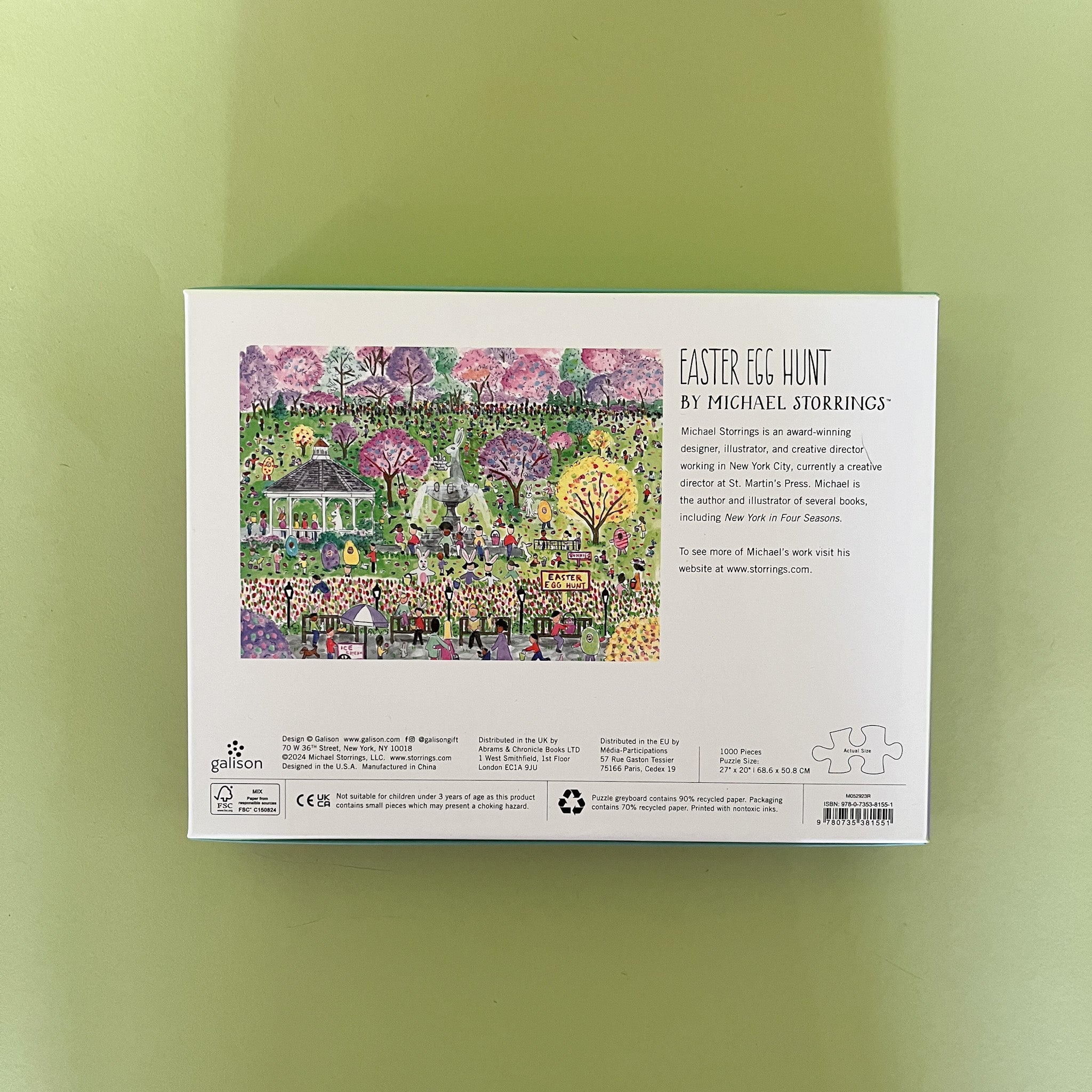 Illustrated 1000-piece puzzle showing a colorful Easter egg hunt scene in a park with people, trees, and spring decorations