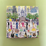 Illustrated 500-piece puzzle showing a lively Easter parade in a city park with people, costumes, and spring decorations