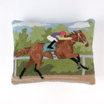 a hooked wool derby day pillow featuring a brown horse and mulitcolor jockey