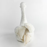 back view of a Feathered Swan Centerpiece in a white background 