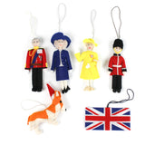 a set of 6 felt british royal family ornaments featuring king charles, queen camilla, queen elizabeth, a guard, a corgi and union jack flag. 