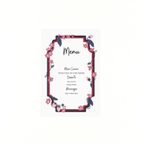 A floral strawberry themed menu card featuring a sample menu layout with decorative pink flowers and a bordered frame.