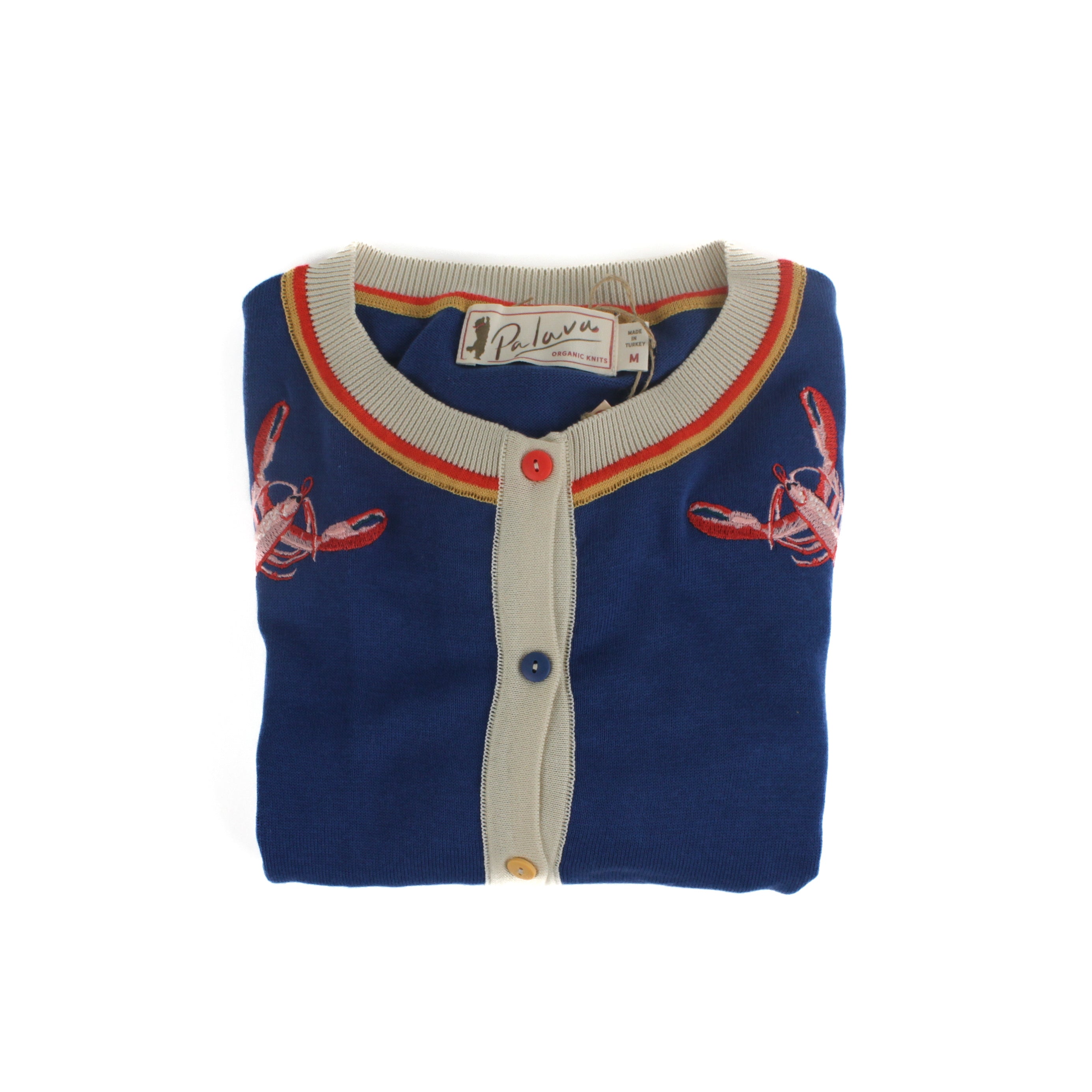 Folded blue knit cardigan with embroidered lobster motifs, contrast trim, and button front with branded label visible