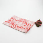 Pink pineapple pattern Christmas tea towel with green and pink tassels on each end