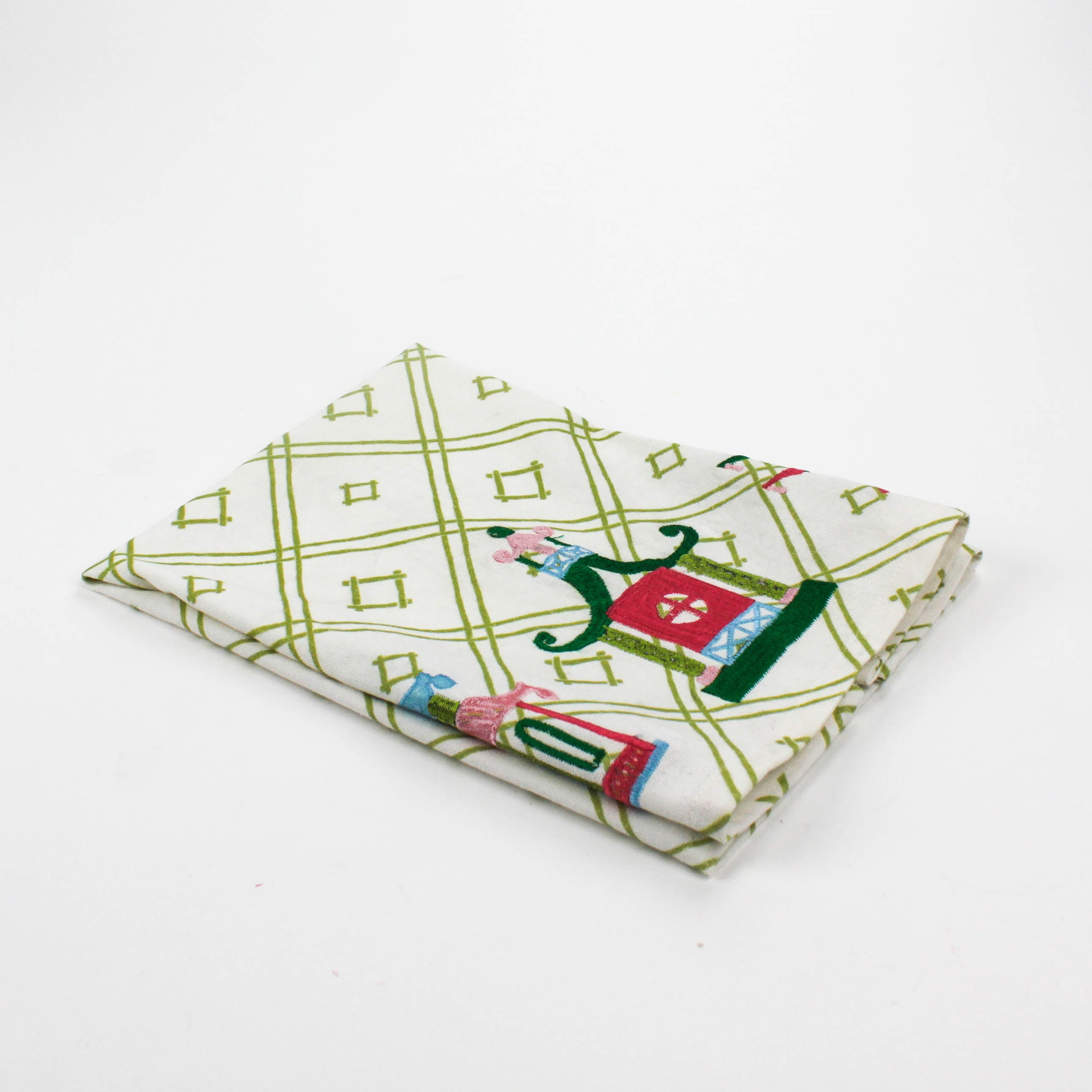 Christmas tea towel with three pagodas in red, green, pink, and blue tones, with a festive chinoiserie style.