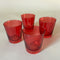 a set of red colored drinking glasses from madcap cottage