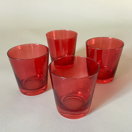 a set of red colored drinking glasses from madcap cottage